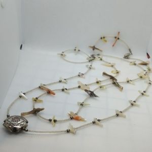 2 Heishi bird fetish necklaces with a silver pendant